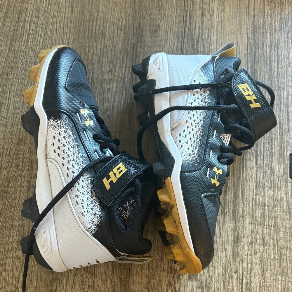 Under Armour Kids' Black, White, and Gold Sneakers